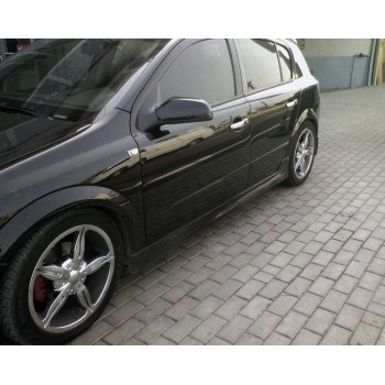 Боковые юбки HB (под покраску) для Opel Astra H 2004-2013 гг